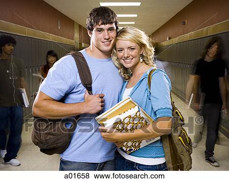 Teenage couple at school. View Large Photo Image Stock Photo - Teenage couple at school.. Fotosearch
