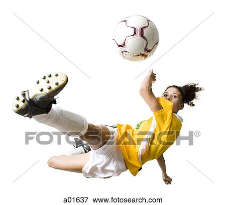 Teenage girl kicking soccer ball View Large Photo Image Stock Photo - Teenage girl kicking soccer ball. Fotosearch