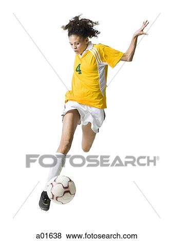 Teenage girl kicking soccer ball View Large Photo Image Stock Photo - Teenage girl kicking soccer ball. Fotosearch
