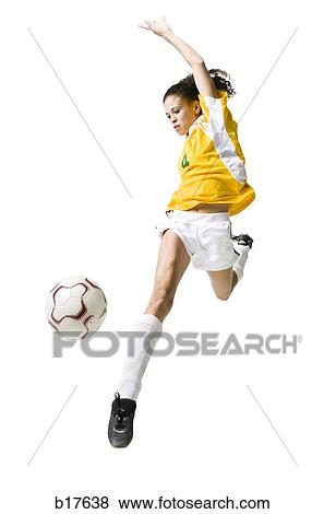 Teenage girl kicking soccer ball View Large Photo Image Stock Photo - Teenage girl kicking soccer ball. Fotosearch