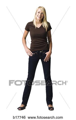 Teenage girl posing and smiling View Large Photo Image Stock Photograph - Teenage girl posing and smiling. Fotosearch