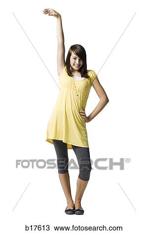 Teenage girl smiling and posing View Large Photo Image Stock Image - Teenage girl smiling and posing. Fotosearch
