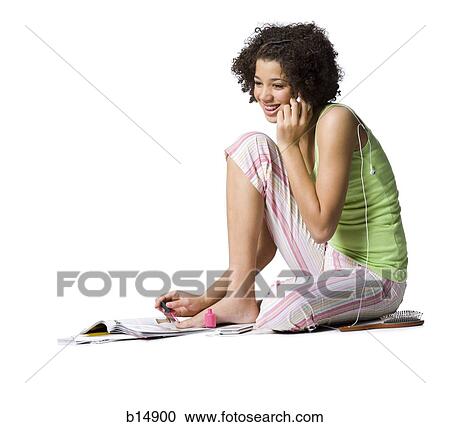 Teenage girl with braces talking on cell phone and painting toenails View Large Photo Image Stock Image - Teenage girl with braces talking on cell phone and painting toenails. Fotosearch