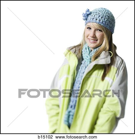 Teenage girl with hat and scarf smiling View Large Photo Image Stock Image - Teenage girl with hat and scarf smiling. Fotosearch
