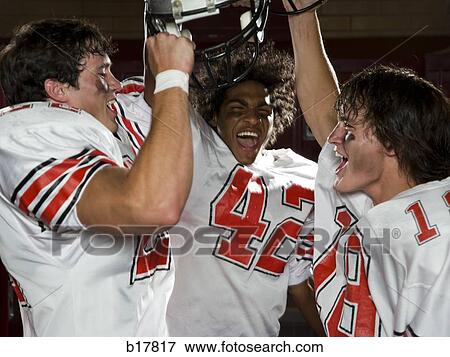 Three High School football players. View Large Photo Image Stock Photo - Three High School football players.. Fotosearch