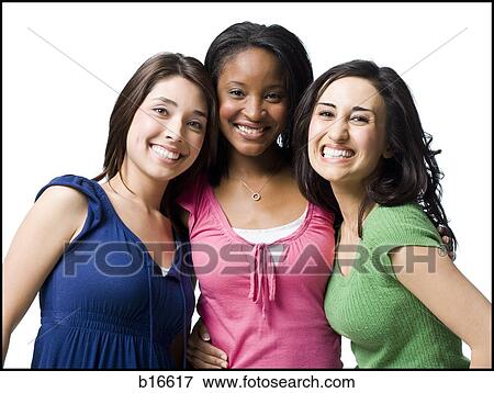Stock Photo - Three women hugging and smiling. Fotosearch