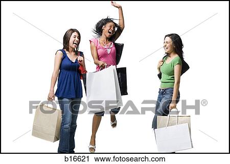 Three women with shopping bags smiling and leaping View Large Photo Image Stock Image - Three women with shopping bags smiling and leaping. Fotosearch