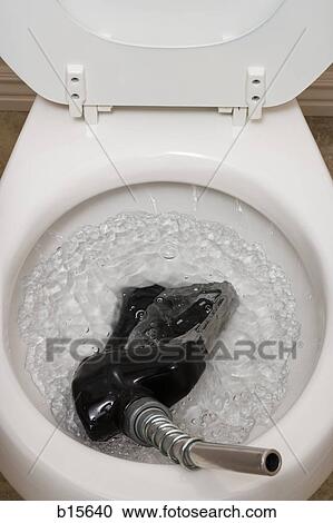 Toilet with gas pump View Large Photo Image Stock Image - Toilet with gas pump. Fotosearch