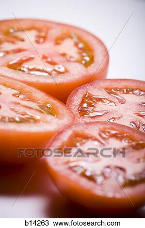 Tomato slices View Large Photo Image Stock Image - Tomato slices. Fotosearch