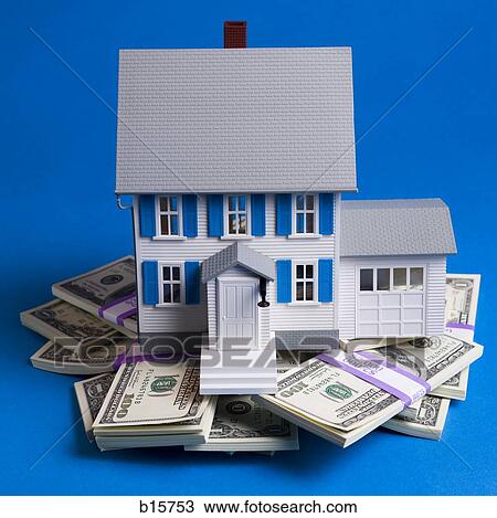 Toy house on pile of one hundred dollar bills View Large Photo Image Stock Image - Toy house on pile of one hundred dollar bills. Fotosearch