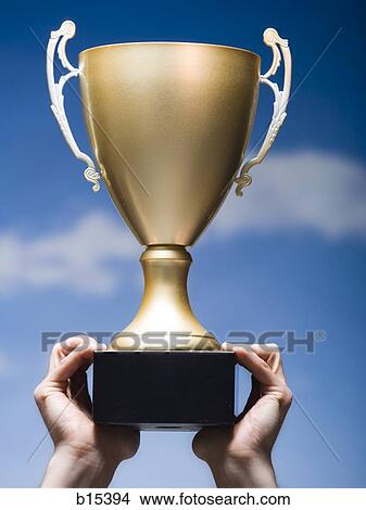 Trophy cup outdoors View Large Photo Image Picture - Trophy cup outdoors. Fotosearch