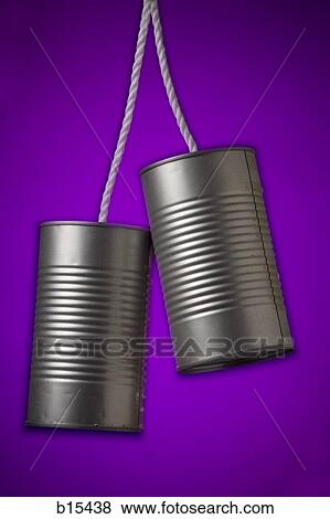 Two cans attached with rope View Large Photo Image Stock Photo - Two cans attached with rope. Fotosearch
