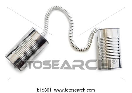 Stock Image - Two cans attached with telephone cord. Fotosearch
