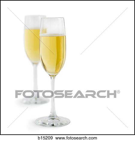 Stock Photo - Two champagne flutes with champagne. Fotosearch