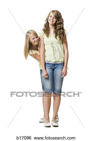 Two girls smiling View Large Photo Image Stock Photograph - Two girls smiling. Fotosearch