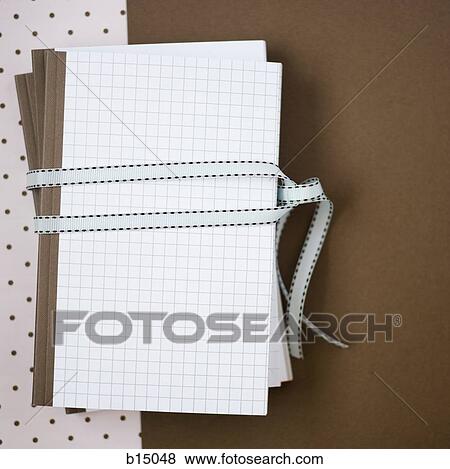 Two hardcover notebooks with ribbon View Large Photo Image Stock Photo - Two hardcover notebooks with ribbon. Fotosearch