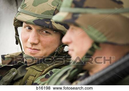 Two soldiers in uniform View Large Photo Image Stock Photo - Two soldiers in uniform. Fotosearch