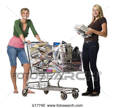Two teenage girls with shopping cart filled with books and magazines View Large Photo Image Stock Image - Two teenage girls with shopping cart filled with books and magazines. Fotosearch