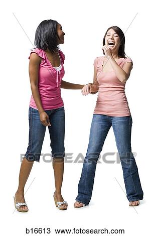 Two women laughing View Large Photo Image Stock Image - Two women laughing. Fotosearch