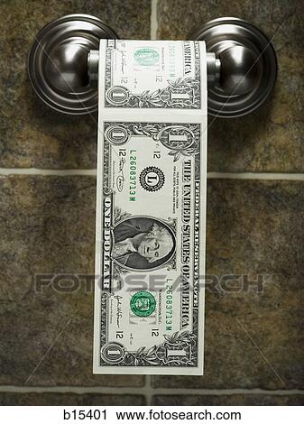 Stock Image - US dollar bills on toilet paper roll. Fotosearch