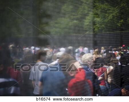 Vietnam Veterans Memorial with reflection of people View Large Photo Image Picture - Vietnam Veterans Memorial with reflection of people. Fotosearch