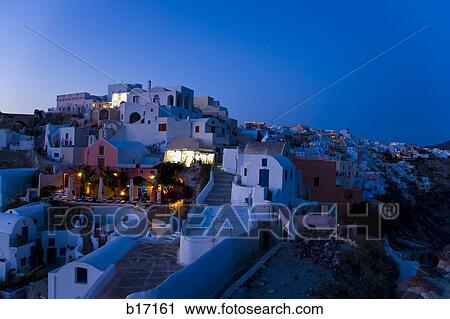 Stock Image - Village on mountain at night. Fotosearch