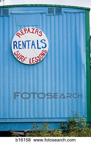 Wall with sign for Repairs Rentals and Surf Lessons View Large Photo Image Stock Photo - Wall with sign for Repairs Rentals and Surf Lessons. Fotosearch