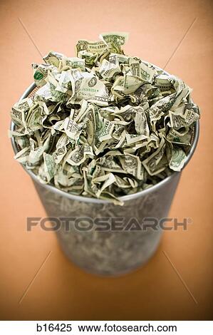 Waste paper basket with crumpled money View Large Photo Image Stock Photography - Waste paper basket with crumpled money. Fotosearch