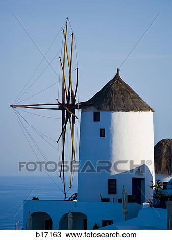 Windmill in village with water View Large Photo Image Stock Image - Windmill in village with water. Fotosearch