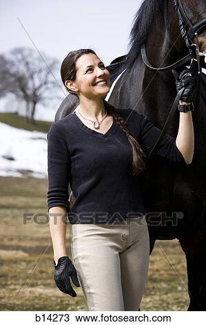 Woman and horse View Large Photo Image Stock Image - Woman and horse. Fotosearch