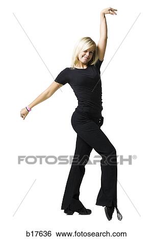 Stock Photograph - Woman dancing and smiling. Fotosearch