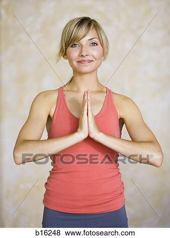 Woman doing yoga View Large Photo Image Stock Photo - Woman doing yoga. Fotosearch