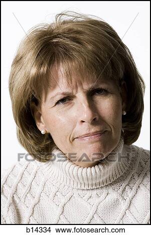 Picture - woman frowning. Fotosearch