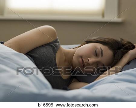 Woman in bed sleeping View Large Photo Image Stock Photography - Woman in bed sleeping. Fotosearch