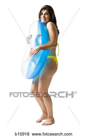 Woman in bikini hugging swimming ring View Large Photo Image Stock Photo - Woman in bikini hugging swimming ring. Fotosearch