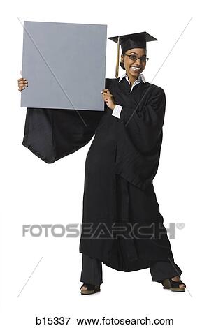 Woman in graduation gown and Blank Sign with blank sign View Large Photo Image Stock Photo - Woman in graduation gown and Blank Sign with blank sign. Fotosearch