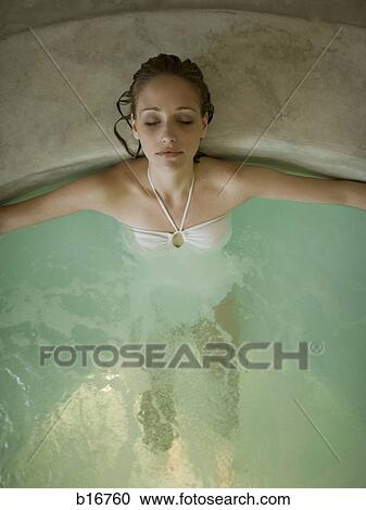Woman in hot tub indoors View Large Photo Image Stock Image - Woman in hot tub indoors. Fotosearch