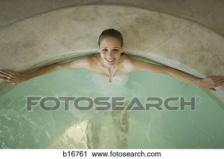 Woman in hot tub indoors View Large Photo Image Stock Image - Woman in hot tub indoors. Fotosearch