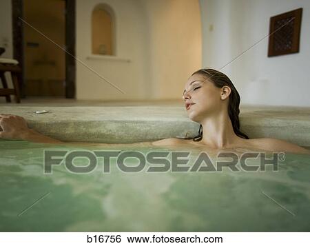 Woman in hot tub indoors View Large Photo Image Stock Photograph - Woman in hot tub indoors. Fotosearch