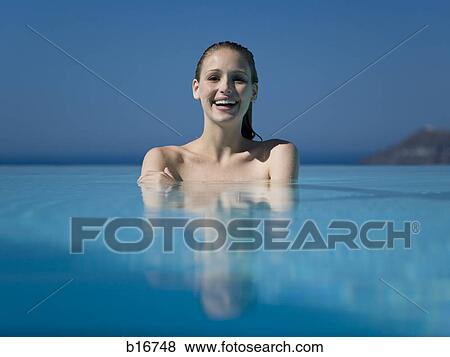 Woman in outdoor pool smiling View Large Photo Image Stock Photo - Woman in outdoor pool smiling. Fotosearch