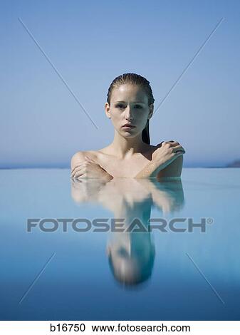Woman in pool outdoors View Large Photo Image Stock Image - Woman in pool outdoors. Fotosearch