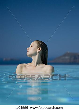 Woman in pool View Large Photo Image Stock Photograph - Woman in pool. Fotosearch