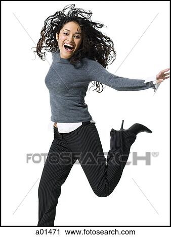 Woman jumping and smiling View Large Photo Image Stock Image - Woman jumping and smiling. Fotosearch