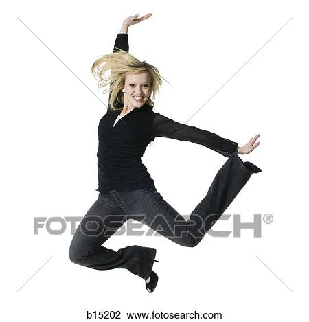 Woman jumping and smiling View Large Photo Image Stock Image - Woman jumping and smiling. Fotosearch