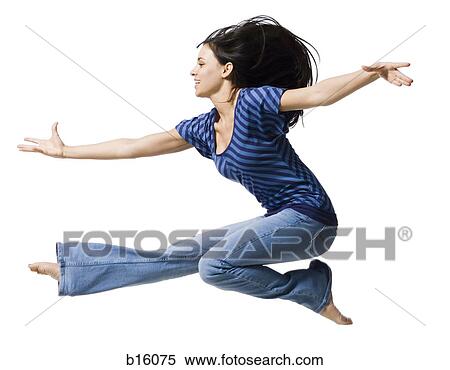 Stock Photography - Woman jumping profile. Fotosearch