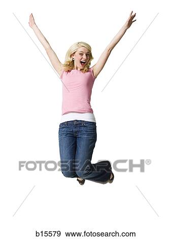 Woman jumping with arms up View Large Photo Image Stock Photo - Woman jumping with arms up. Fotosearch