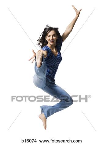Woman kicking and smiling View Large Photo Image Picture - Woman kicking and smiling. Fotosearch