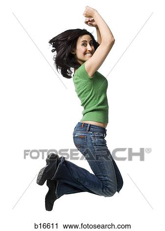 Woman leaping and smiling View Large Photo Image Stock Image - Woman leaping and smiling. Fotosearch