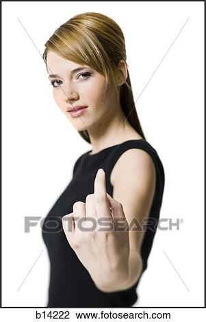 Stock Image - Woman looking at the camera.. Fotosearch