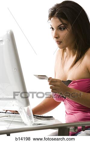 Woman on computer View Large Photo Image Stock Photo - Woman on computer. Fotosearch